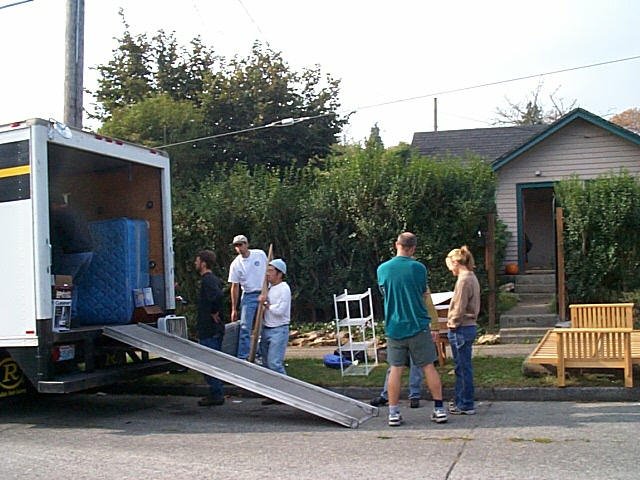 moving crew 3 Loading up Kathryn's 700 sq ft shack. Lots more moving helpers joined the crew. Ah...the drawing of power of beer with ultimate players.