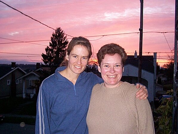 megan & kathryn at sunset Kathryn and Megan in front of an awesome sunset and some almost-as-lovely wires.
