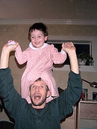 victoria & martin playing 1 Either Martin has a silly hat or Victoria is giving birth to Martin.