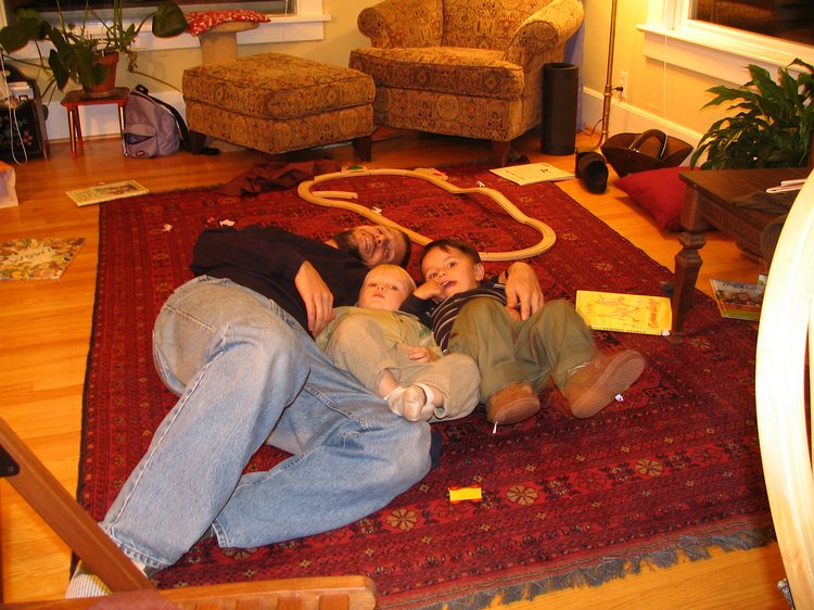 img_1582 Martin, Gavin, and Aidan enjoy a post-dinner lie down.