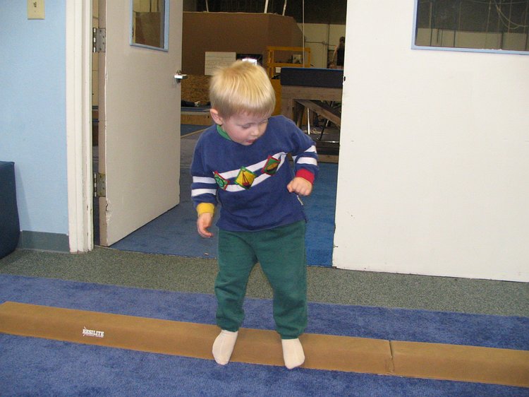 img_3038 Most kids like to walk on the balance beam going forwards. Gavin somehow thinks it's cooler to shimmy sideways.