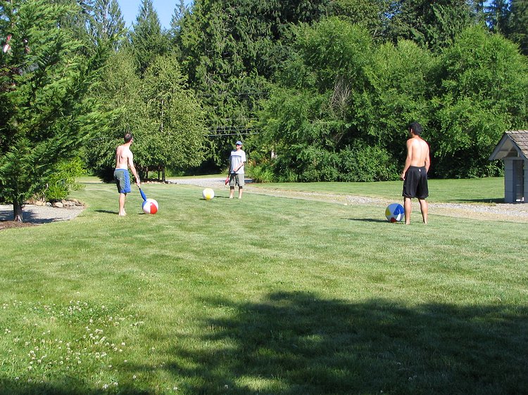 img_4096 And here is that alternate use. Three 30+ year old men armed with a beach ball and a juggling pin. The game involves trying to peg the other guys with your...