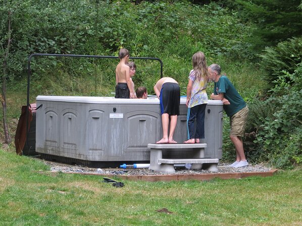 img_0209 Kids have found the hot tub and managed to track a ton of grass into it. Good work, kids! Way to do exactly what we'd expect.