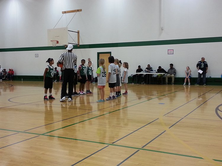 2015-01-09 19.17.48 Zoe plays one of her only basketball games ever. It did not go well.
