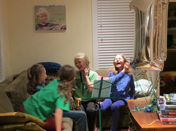 img_2915 Evidently Violet trying to play Zoe's saxophone is hilarious.