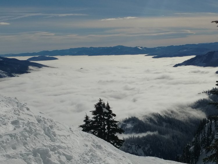 camerazoom-20170129112515335 Looking down over a cloud covered Snoqualmie Pass.