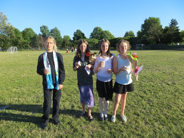 img_3774 Zoe, Mollie, Violet, and Addie enjoying treats in back of the school.