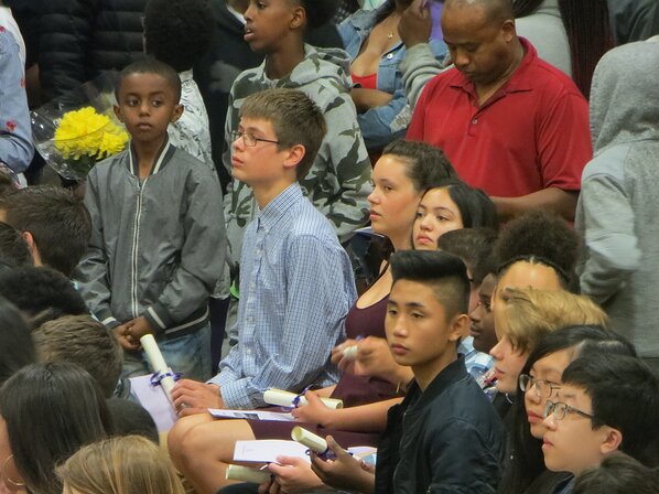 img_5598 Still listening attentively to the principal (who nobody likes).