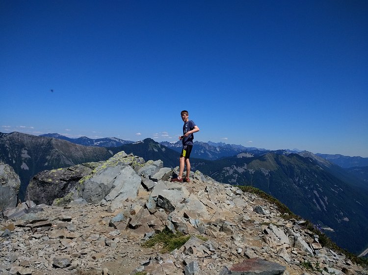 2018-07-22 14.13.48 Gavin atop McClellan Butte after the always exciting rock scramble.