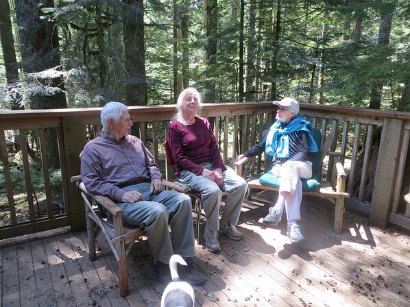 img_5360 Hans, Margrit and Colby hanging out on the snow-free deck.