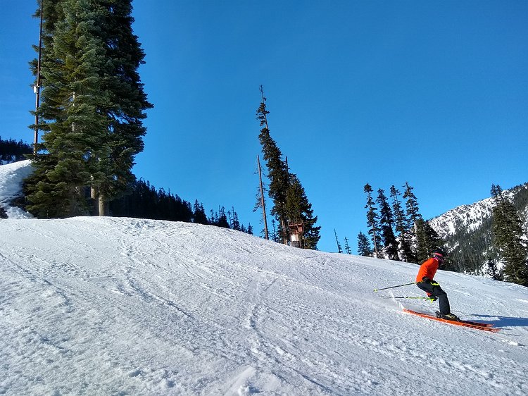 2019-01-27 13.53.29 Gavin almost riding on his butt after a jumping off the ridge near the bottom of Alpental.
