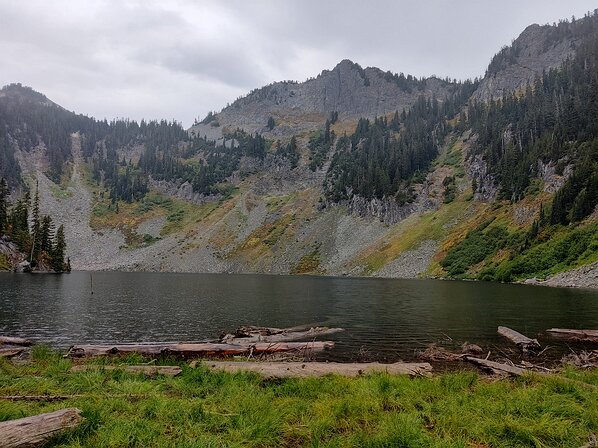 2022-09-28 13.15.13 After navigating a talus field and following the trail up the shore of Alaska Lake was reached. Up above, crossing below the rocky cliffs, is the Pacific Crest...