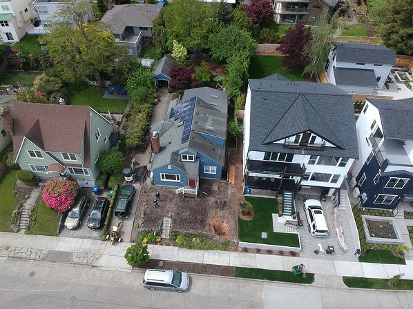 house drone3 Drone shot of our house during the front yard reboot. The guy who used the crazy machine he towed to grind out a stump in the lower right totally randomly...