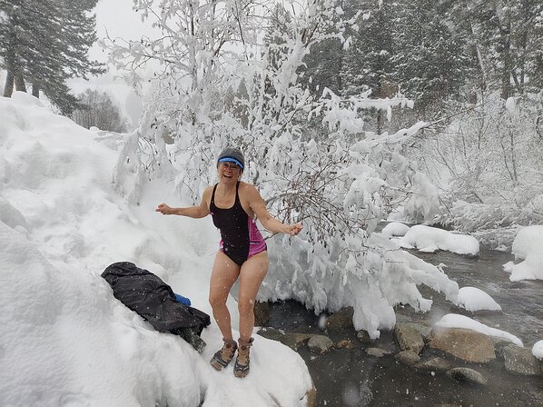 2025-02-13 14.46.52 Kathryn about to climb into a natural hot springs.